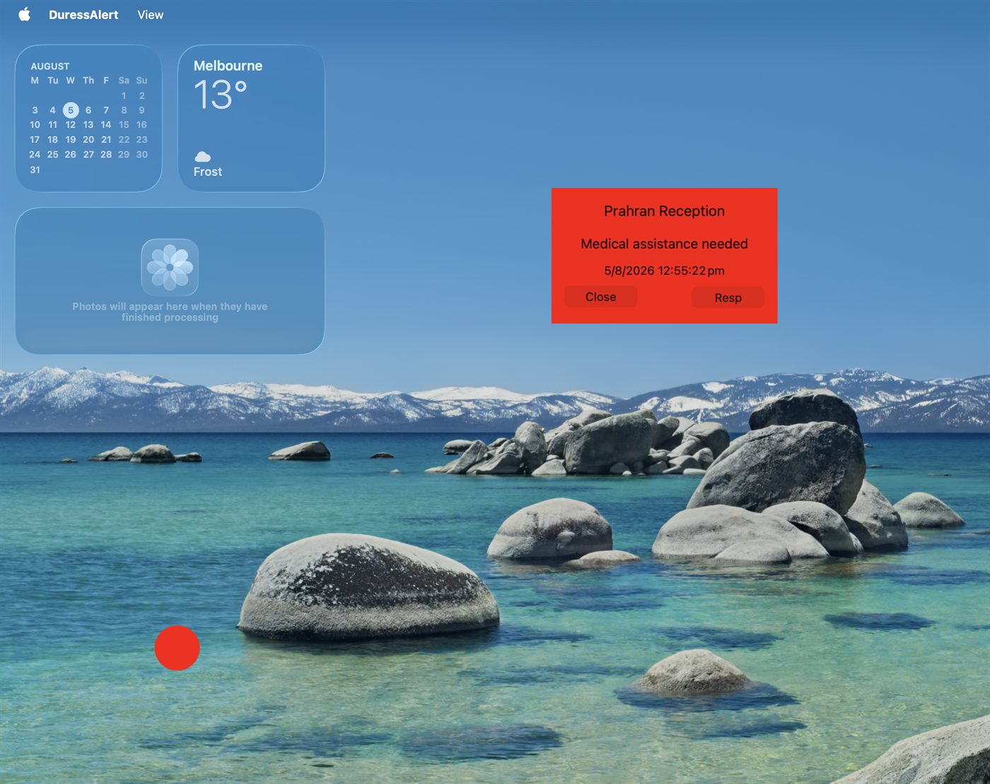 Red Duress Alert popup on a Mac desktop identifying Prahran Reception with the message Medical assistance needed.